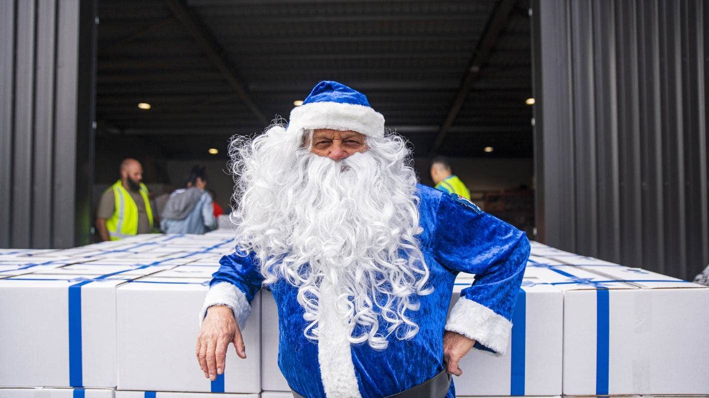 blue santa with presents